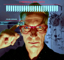 a man wearing glasses is looking at a screen that says cyberdeck ram 24/24 on it