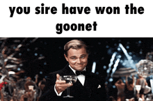 a picture of a man in a tuxedo holding a glass of wine with the caption you sire have won the goonet