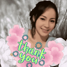 a woman is surrounded by pink and white flowers and a thank you message