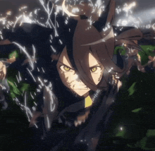 a close up of a person 's face in a dark room