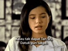 a woman with a caption that says " kalau tak dapat tan sri "