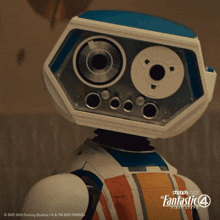 a robot from the fantastic four first steps looks at the camera