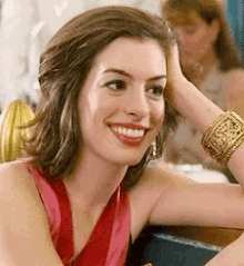 anne hathaway smile content happy flirty