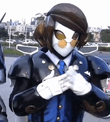 a man in a suit and tie is wearing a mask
