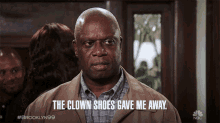 The Clown Shoes Gave Me Away Captain Ray Holt GIF - The Clown Shoes Gave Me Away Captain Ray Holt Andre Braugher GIFs