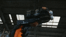 a robot is flying through the air in a room with a roof that is open