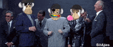 a group of men in suits with monkey faces on their faces and the word bitapes on the bottom