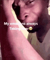a close up of a man 's face with the words `` my emotions always taking over '' written on it .
