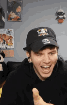 a man wearing a hat that says 47 on it is smiling