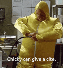 a man in a yellow suit with the words " chicky can give a cite " written below him