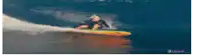 a person is riding a wave on a surfboard