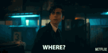 a man in a suit is asking where in a netflix ad