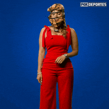 a fox deportes ad with a woman wearing a catcher 's helmet