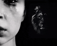 a black and white photo of a woman crying next to a picture of a lion