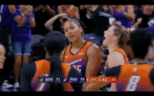 a female basketball player wearing a number 25 jersey