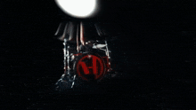 a blurred image of a dark room with a few lights