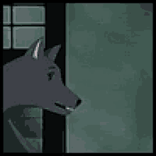a black cat with big white eyes is standing in front of a door with its mouth open .