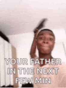 a man is holding a knife in his hand and says `` your father in the next few min ''
