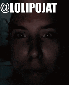 a close up of a woman 's face with the words @lolipojat written above it