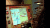 a tnt sign hangs above an arcade game machine