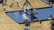 a basketball player with the number 4 on the back of his shirt
