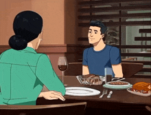 a man and a woman are sitting at a table with a basket of bread on it