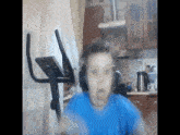 a person wearing headphones is standing next to an exercise bike