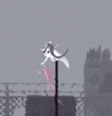 a pixel art of a cat with wings flying over a pole .