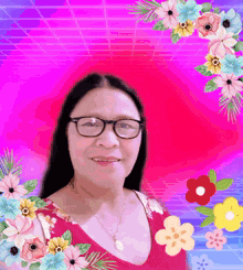 a woman wearing glasses and a red shirt is surrounded by flowers