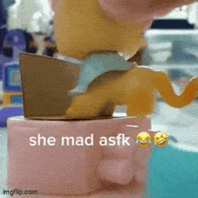 a picture of a toy with the words she mad asfk written on it