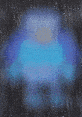 a person is swimming in a pool with a light coming out of it