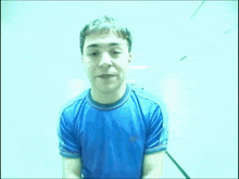 a young man in a blue shirt has the number 11 on his shirt