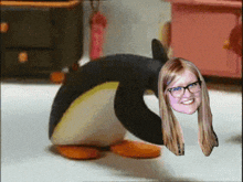 a penguin with a woman 's head on its back