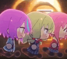 a group of anime girls are standing next to each other in a dark room .