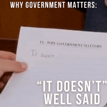 a man sitting at a desk with the words " it does n't well said "