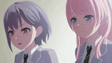 two anime girls are standing next to each other and one has a serious look on her face