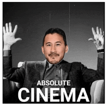 an ad for absolute cinema features a man in a suit and tie