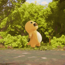 a stuffed animal in a dinosaur costume is jumping in the air in a forest .