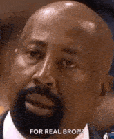 a bald man with a beard is looking at the camera and says `` for real bro ? ''