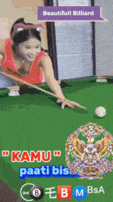 a woman is playing pool with the words beautiful billiard kamu paati bis on the bottom