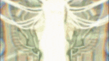 a blurry picture of a person 's skeleton with a white light coming out of it