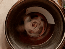 a close up of the inside of a washing machine with a circular pattern