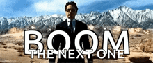 a man in a suit and tie is standing in front of a mountain and the words boom the next one
