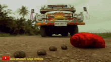 a gmm grammy gold official video shows a car on a dirt road