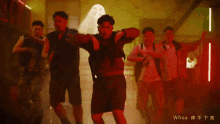 a group of people are dancing in a dark room with the words whoa written on the bottom