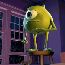 mike from monsters inc standing on a stool