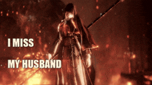 a picture of a woman with a sword and the words i miss my husband