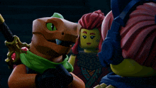 a group of lego characters including a lizard and a woman