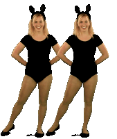 two women in black leotards with bunny ears on their head