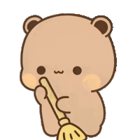 a brown teddy bear holding a yellow broom in its mouth